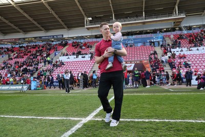 180426 - Scarlets v Cardiff Rugby - United Rugby Championship - Liam Williams walks on the field before kick off with his son