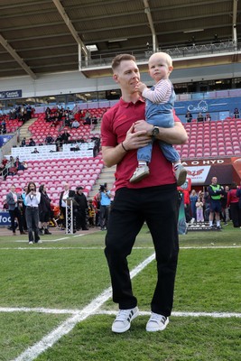 180426 - Scarlets v Cardiff Rugby - United Rugby Championship - Liam Williams walks on the field before kick off with his son