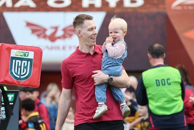 180426 - Scarlets v Cardiff Rugby - United Rugby Championship - Liam Williams walks on the field before kick off with his son