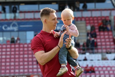 180426 - Scarlets v Cardiff Rugby - United Rugby Championship - Liam Williams walks on the field before kick off with his son