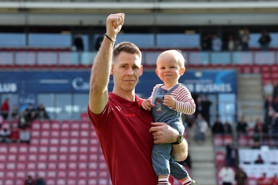 180426 - Scarlets v Cardiff Rugby - United Rugby Championship - Liam Williams walks on the field before kick off with his son