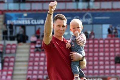 180426 - Scarlets v Cardiff Rugby - United Rugby Championship - Liam Williams walks on the field before kick off with his son