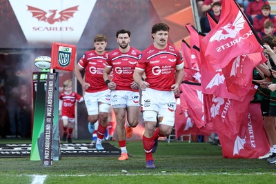 180426 - Scarlets v Cardiff Rugby - United Rugby Championship - Fletcher Anderson of Scarlets leads his side out