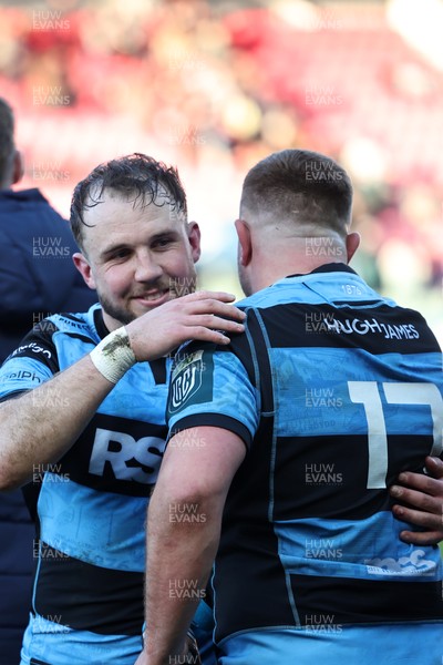 180426 - Scarlets v Cardiff Rugby - United Rugby Championship - Ioan Lloyd and Danny Southworth of Cardiff Rugby celebrate at the final whistle 