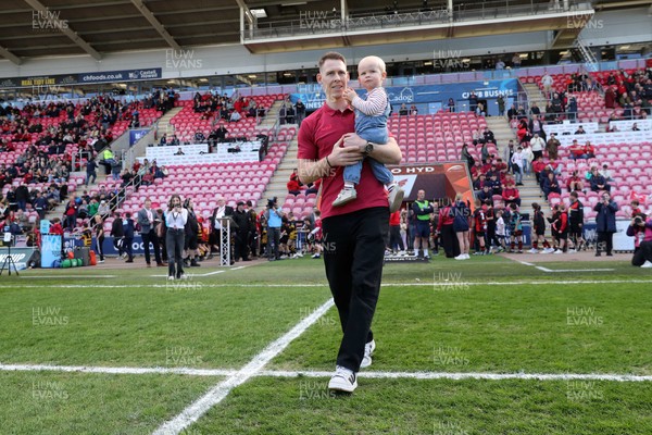 180426 - Scarlets v Cardiff Rugby - United Rugby Championship - Liam Williams walks on the field before kick off with his son