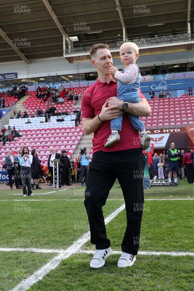 180426 - Scarlets v Cardiff Rugby - United Rugby Championship - Liam Williams walks on the field before kick off with his son