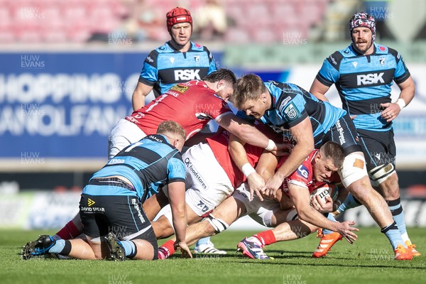180426 - Scarlets v Cardiff Rugby - United Rugby Championship - Jarrod Taylor of Scarlets is stopped 