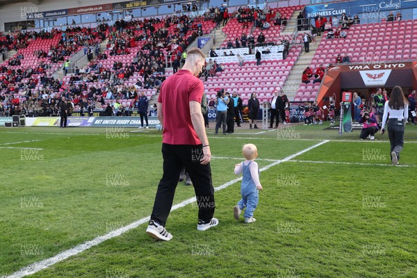 180426 - Scarlets v Cardiff Rugby - United Rugby Championship - Liam Williams walks on the field before kick off with his son
