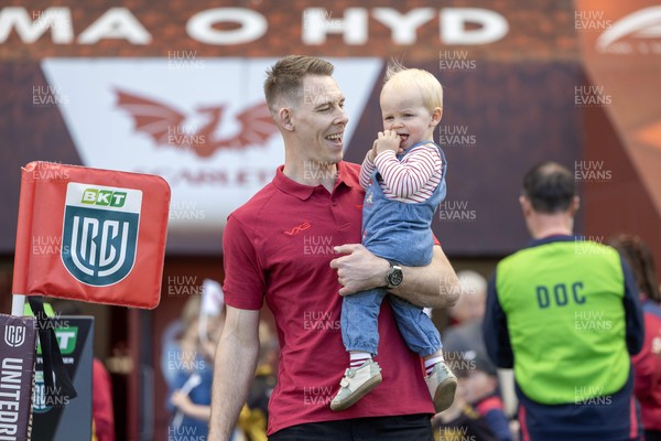 180426 - Scarlets v Cardiff Rugby - United Rugby Championship - Liam Williams walks on the field before kick off with his son