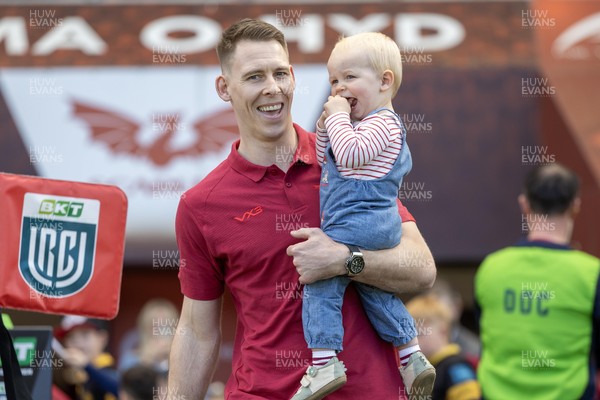 180426 - Scarlets v Cardiff Rugby - United Rugby Championship - Liam Williams walks on the field before kick off with his son