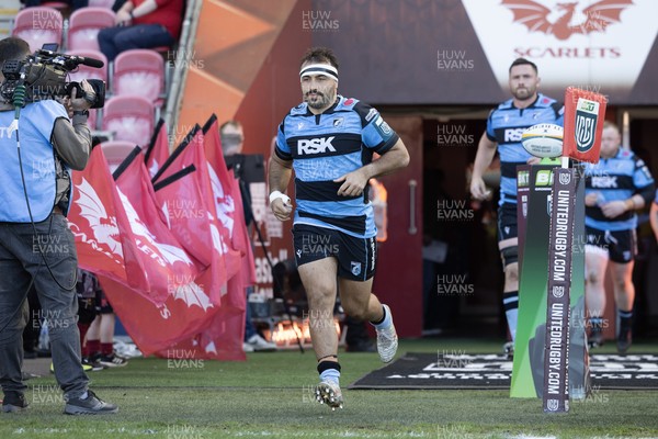 180426 - Scarlets v Cardiff Rugby - United Rugby Championship - Liam Belcher of Cardiff Rugby leads his side out 