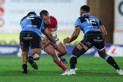 260926 - Scarlets v Cardiff Rugby - United Rugby Championship - Ryan Elias of Scarlets is tackled by Liam Belcher of Cardiff