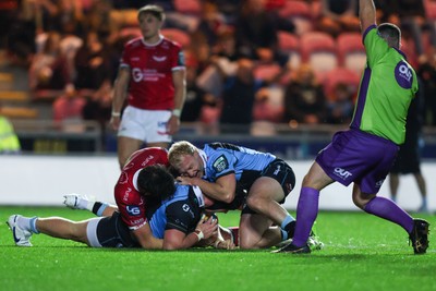 260926 - Scarlets v Cardiff Rugby - United Rugby Championship - Efan Lloyd of Cardiff is congratulated by Johan Mulder of Cardiff after scoring a try