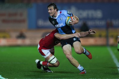 260926 - Scarlets v Cardiff Rugby - United Rugby Championship - Le Roux Malan of Cardiff is tackled by Tristan Davies of Scarlets