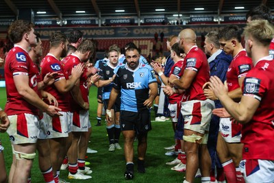 260926 - Scarlets v Cardiff Rugby - United Rugby Championship - Liam Belcher of Cardiff leads his team as Scarlets clap Cardiff off at the end of the match