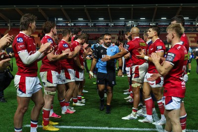 260926 - Scarlets v Cardiff Rugby - United Rugby Championship - Liam Belcher of Cardiff leads his team as Scarlets clap Cardiff off at the end of the match