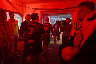 260926 - Scarlets v Cardiff Rugby - United Rugby Championship - Players run out of the tunnel for the match