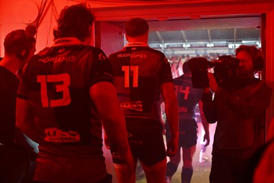 260926 - Scarlets v Cardiff Rugby - United Rugby Championship - Players run out of the tunnel for the match