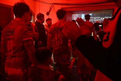 260926 - Scarlets v Cardiff Rugby - United Rugby Championship - Players run out the tunnel before the match