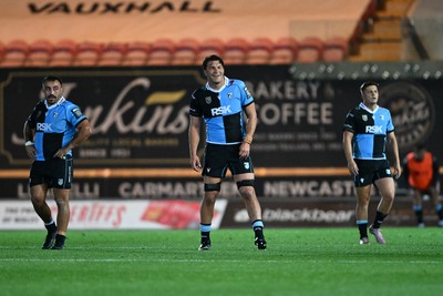260926 - Scarlets v Cardiff Rugby - United Rugby Championship - Liam Belcher of Cardiff Rugby, Teddy Williams of Cardiff Rugby and Callum Sheedy of Cardiff Rugby
