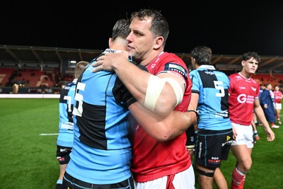 260926 - Scarlets v Cardiff Rugby - United Rugby Championship - Teddy Williams of Cardiff Rugby and Ryan Elias of Scarlets at full time