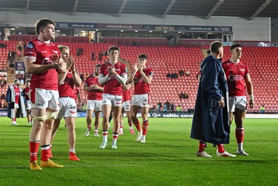 260926 - Scarlets v Cardiff Rugby - United Rugby Championship - Scarlets players applaud fans at full time