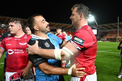 260926 - Scarlets v Cardiff Rugby - United Rugby Championship - Liam Belcher of Cardiff Rugby and Ryan Elias of Scarlets at full time