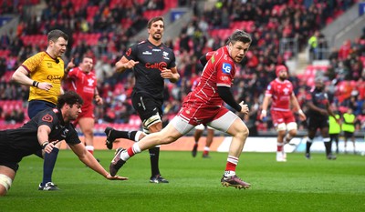 250323 - Scarlets v Sharks - United Rugby Championship - Steff Evans of Scarlets scores try