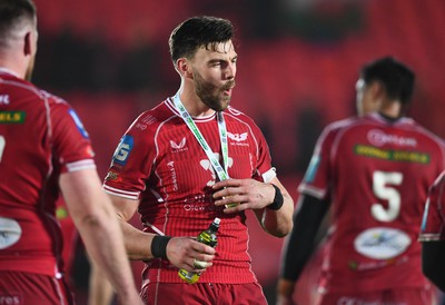 250323 - Scarlets v Sharks - United Rugby Championship - Johnny Williams of Scarlets celebrates win