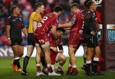 250323 - Scarlets v Cell C Sharks - United Rugby Championship - Steff Evans of Scarlets celebrates scoring a try with team mates