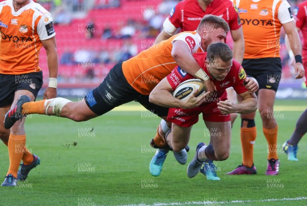 050518 - Scarlets v Cheetahs, Guinness PRO14 - Tom Prydie of Scarlets is tackled by Paul Schoeman of Cheetahs to prevent a try