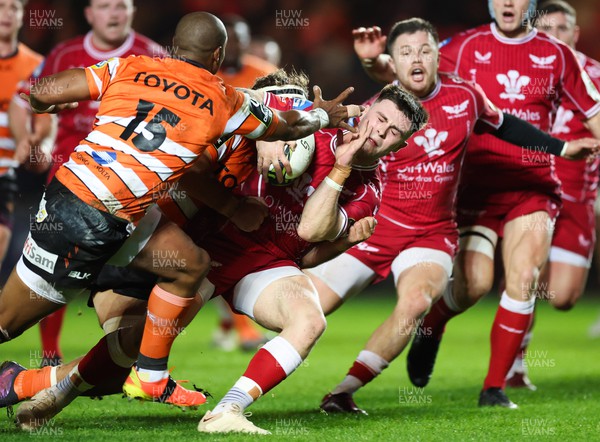 130123 - Scarlets v Toyota Cheetahs, ECPR Challenge Cup - Joe Roberts of Scarlets is tackled short of the line