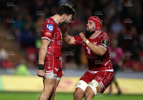 070423 - Scarlets v Clermont Auvergne - European Challenge Cup quarter-final - Johnny Williams of Scarlets celebrates scoring a try with Josh Macleod