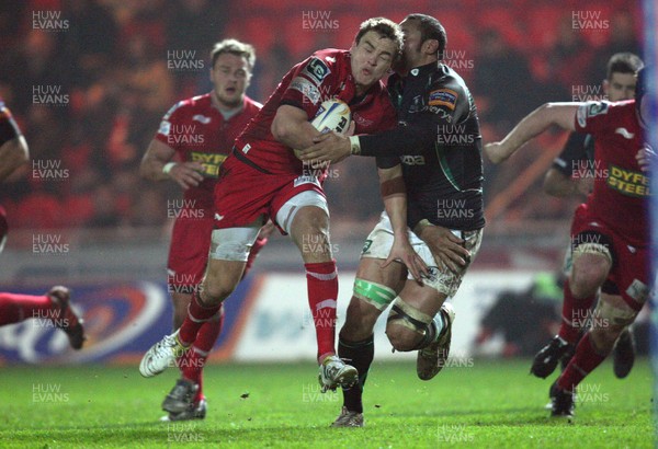 020312 - Scarlets v Connacht, RaboDirect PRO12 - Scarlets Gareth Maule is held short of the line