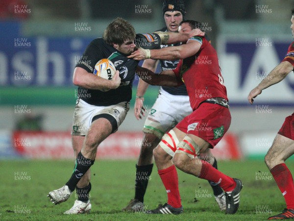 020312 - Scarlets v Connacht, RaboDirect PRO12 - Connacht's Peter Borlase holds off Scarlets Aaron Shingler    