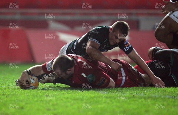 020312 - Scarlets v Connacht, RaboDirect PRO12 - Scarlets Phil John powers over to score try 