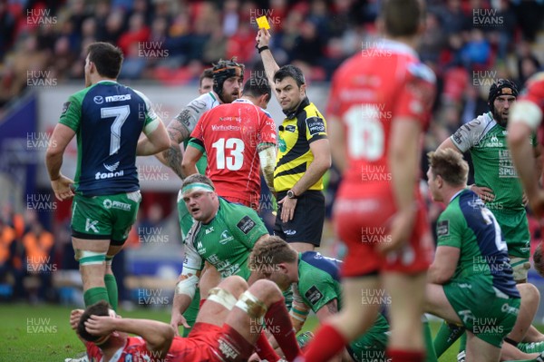 100116 - Scarlets v Connacht - Guinness PRO12 -Referee Marius Mitrea shows Regan King of Scarlets (13) a yellow card