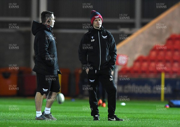 190222 - Scarlets v Connacht - United Rugby Championship - Joe Lewis and Scarlets head coach Dwayne Peel during the warm up