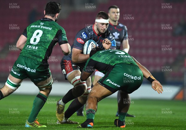 190222 - Scarlets v Connacht - United Rugby Championship - Morgan Jones of Scarlets is tackled by Tietie Tuimauga of Connacht