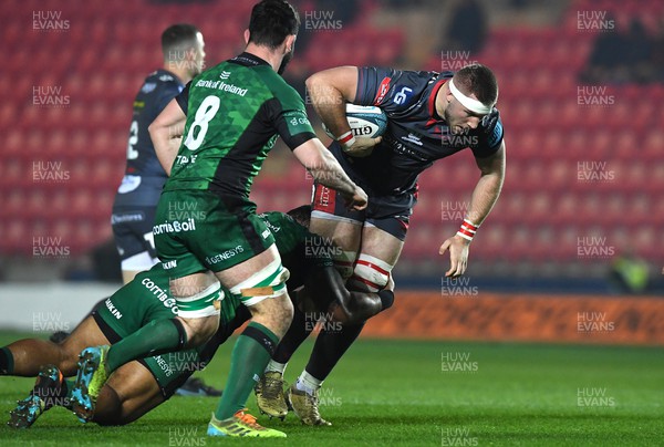 190222 - Scarlets v Connacht - United Rugby Championship - Morgan Jones of Scarlets is tackled by Tietie Tuimauga of Connacht