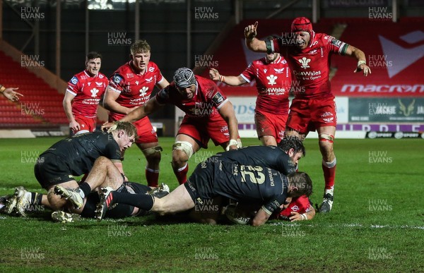 220321 Scarlets v Connacht, Guinness PRO14 - Scarlets players celebrate as Javan Sebastian of Scarlets powers over to score try