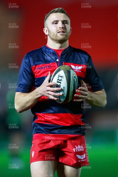 220321 - Scarlets v Connacht - Guinness PRO14 -  Tom Prydie of Scarlets warms up ahead of the match