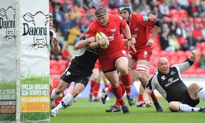 25.04.10 -  Scarlets v Connacht - Magners League - Rhys Thomas of Scarlets drives through to score try. 