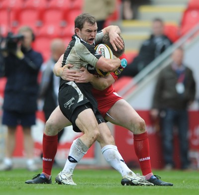 25.04.10 -  Scarlets v Connacht - Magners League - Connor O'Loughlin of Connacht is held by Rhys Priestland of Scarlets. 