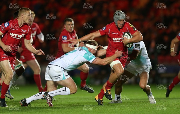 290917 - Scarlets v Connacht - Guinness PRO14 - Jonathan Davies of Scarlets is tackled by Tom McCartney of Connacht