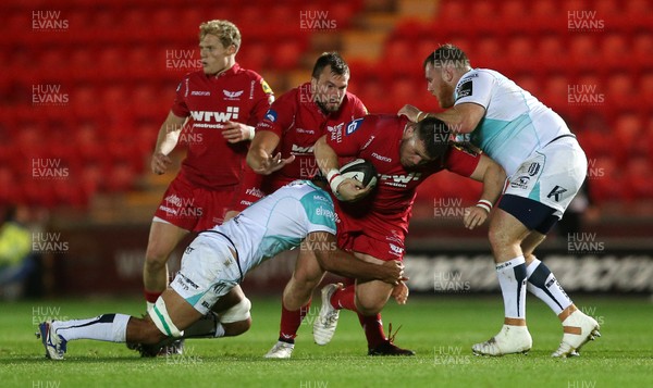 290917 - Scarlets v Connacht - Guinness PRO14 - Rob Evans of Scarlets is tackled by Jarrad Butler of Connacht