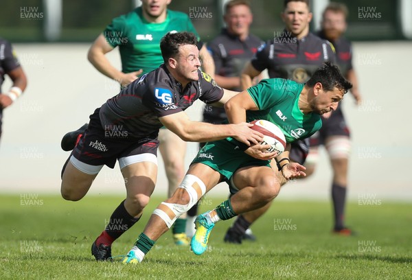 290918 - Scarlets A v Connacht Eagles, Celtic Cup, Carmarthen - Ryan Conbeer of Scarlets chases down James Mitchell of Connacht Eagles