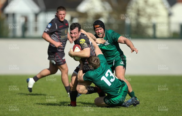 290918 - Scarlets A v Connacht Eagles, Celtic Cup, Carmarthen - Ryan Conbeer of Scarlets is tackled by Eoin Griffin of Connacht Eagles
