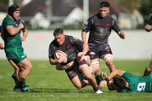 290918 - Scarlets A v Connacht Eagles, Celtic Cup, Carmarthen - Dafydd Hughes of Scarlets is tackled as he charges towards the line