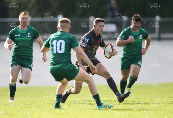 290918 - Scarlets A v Connacht Eagles, Celtic Cup, Carmarthen - Steff Hughes of Scarlets takes on Conor Fitzgerald of Connacht Eagles